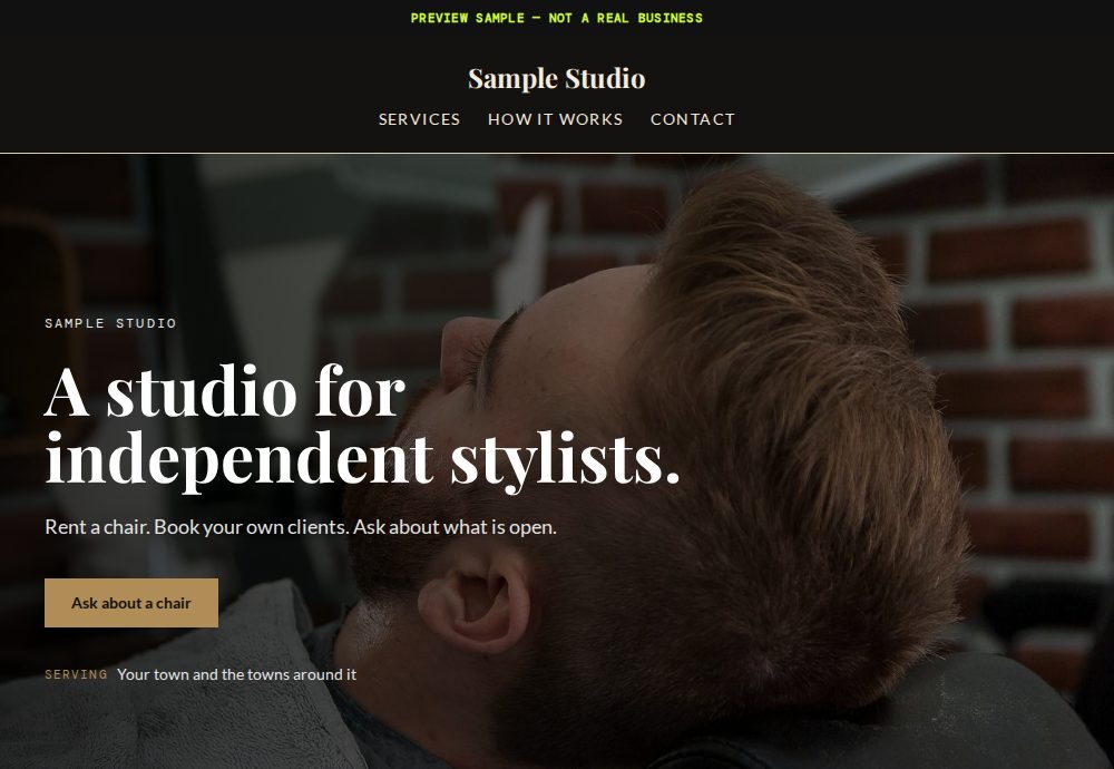 A sample studio site: serif headline over a barber-chair photo on black